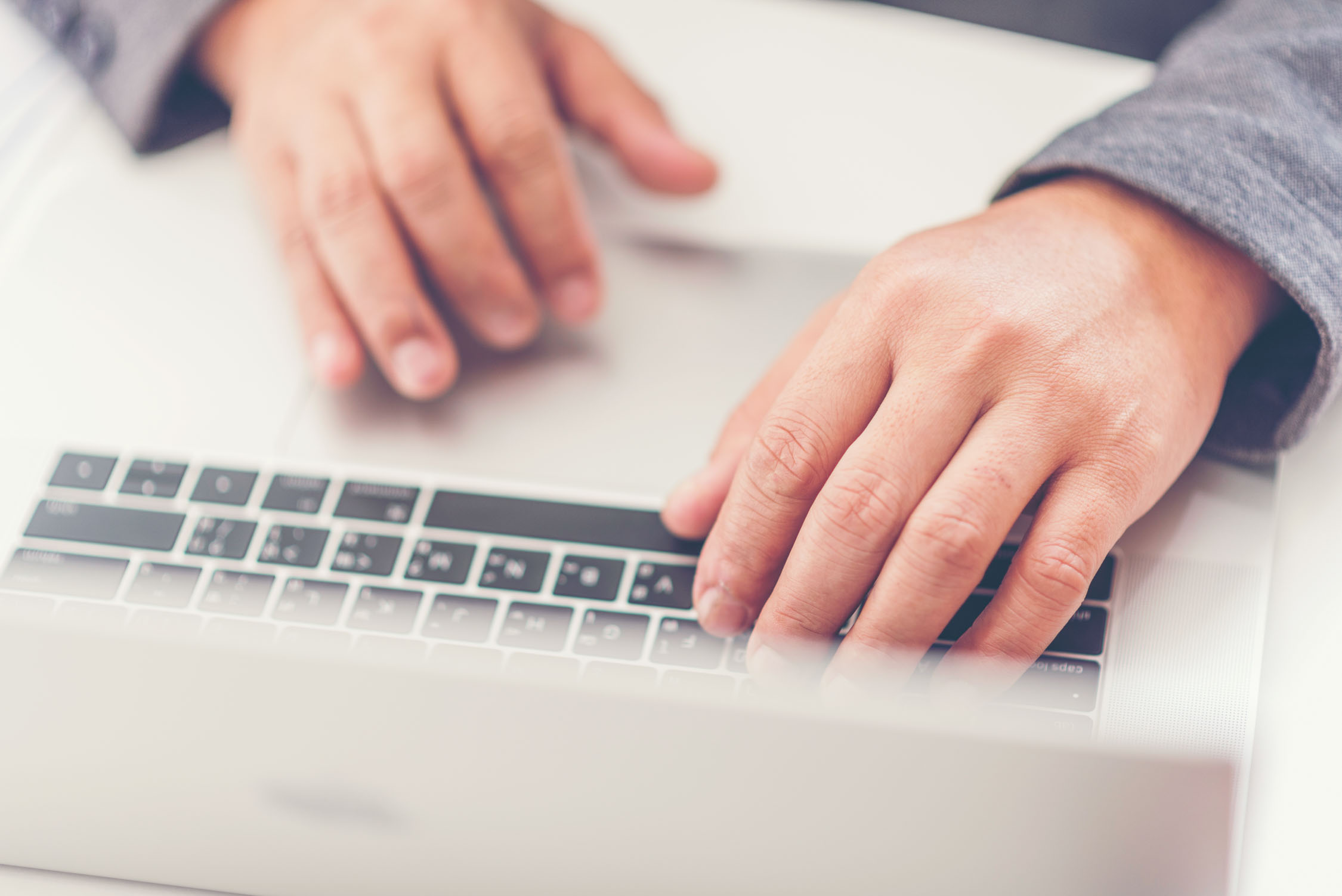 Business man working at office with laptop and documents on his desk, consultant lawyer concept